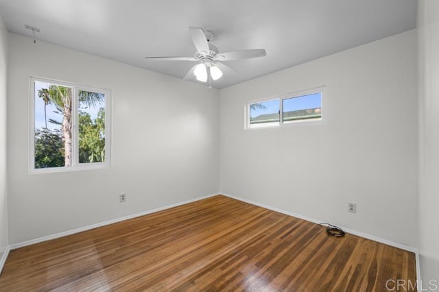 4454 Ute Dr, San Diego, CA 92117 - spare room featuring plenty of natural light, wood finished floors, and ceiling fan