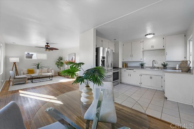 4454 Ute Dr, San Diego, CA 92117 - dining space featuring ceiling fan and light tile patterned flooring
