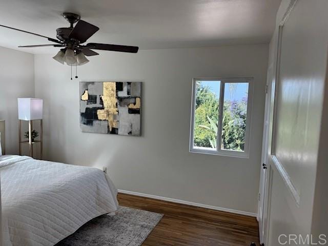 4454 Ute Dr, San Diego, CA 92117 - bedroom featuring wood finished floors and ceiling fan