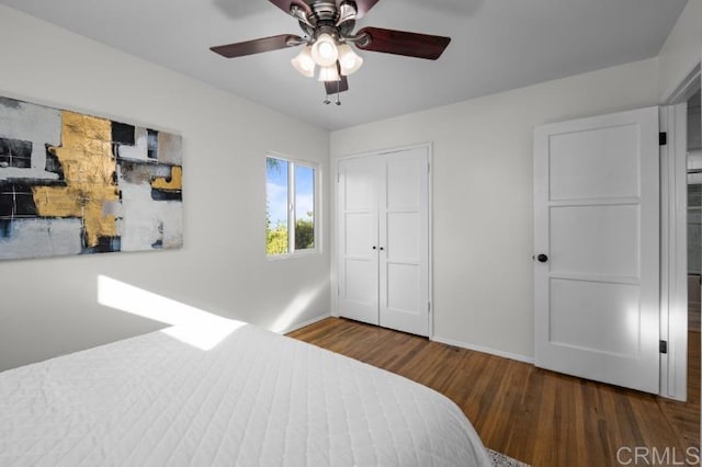 4454 Ute Dr, San Diego, CA 92117 - bedroom featuring wood finished floors, a closet, and a ceiling fan