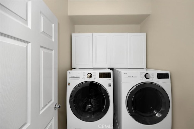 1581 Manor Ln, Glendora, CA 91741 - laundry area featuring separate washer and dryer and cabinet space