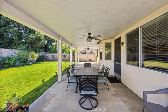 1581 Manor Ln, Glendora, CA 91741 - fenced backyard with outdoor dining area, a patio area, and ceiling fan