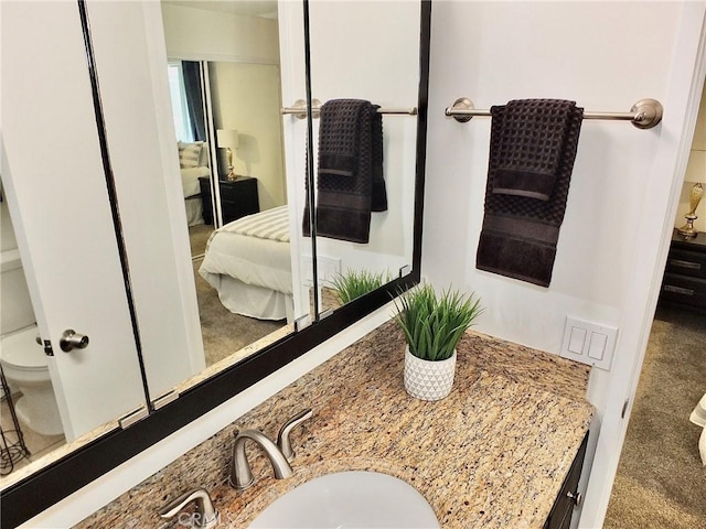 16573 Pescado Ln Unit 3A, Huntington Beach, CA 92649 - ensuite bathroom with toilet and vanity
