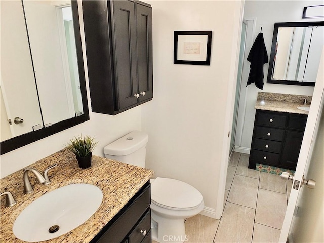 16573 Pescado Ln Unit 3A, Huntington Beach, CA 92649 - bathroom featuring vanity and tile patterned flooring