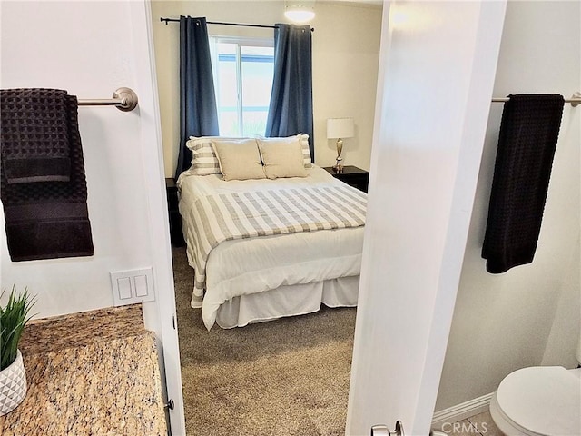 16573 Pescado Ln Unit 3A, Huntington Beach, CA 92649 - bedroom featuring baseboards and carpet floors