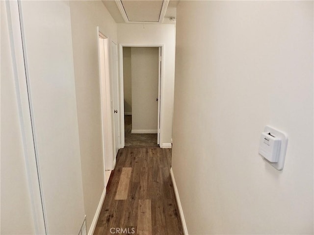 16573 Pescado Ln Unit 3A, Huntington Beach, CA 92649 - hall featuring dark wood-style flooring and attic access