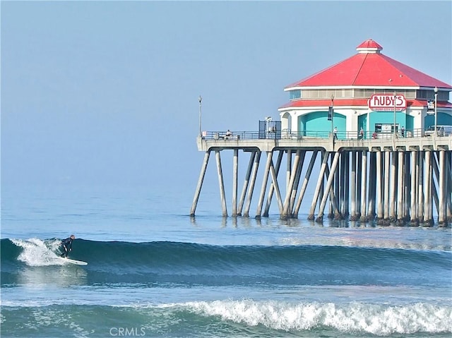16573 Pescado Ln Unit 3A, Huntington Beach, CA 92649 - dock area featuring a pier and a water view