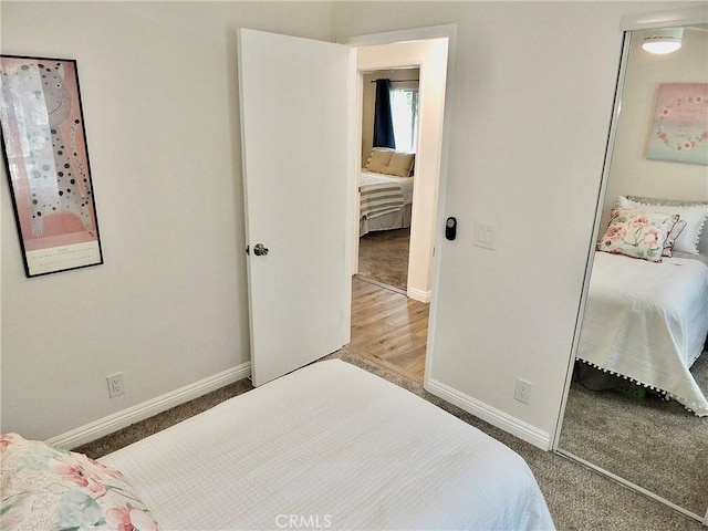 16573 Pescado Ln Unit 3A, Huntington Beach, CA 92649 - bedroom with baseboards and carpet
