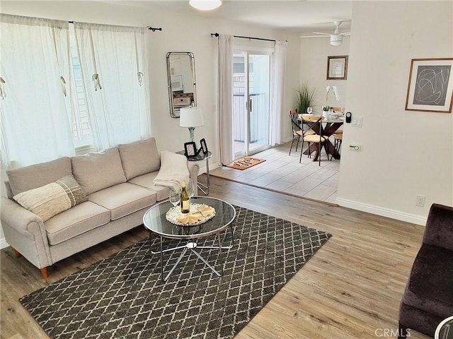 16573 Pescado Ln Unit 3A, Huntington Beach, CA 92649 - living area featuring wood finished floors and baseboards