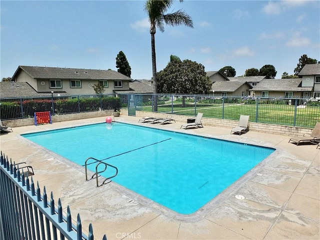16573 Pescado Ln Unit 3A, Huntington Beach, CA 92649 - community pool featuring a patio and a residential view