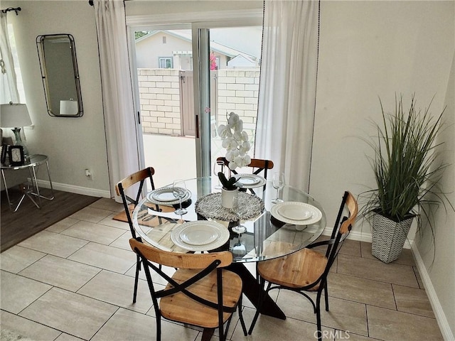 16573 Pescado Ln Unit 3A, Huntington Beach, CA 92649 - dining room with light tile patterned flooring
