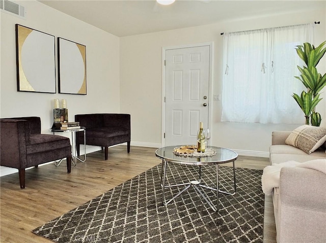16573 Pescado Ln Unit 3A, Huntington Beach, CA 92649 - living area with wood finished floors and baseboards