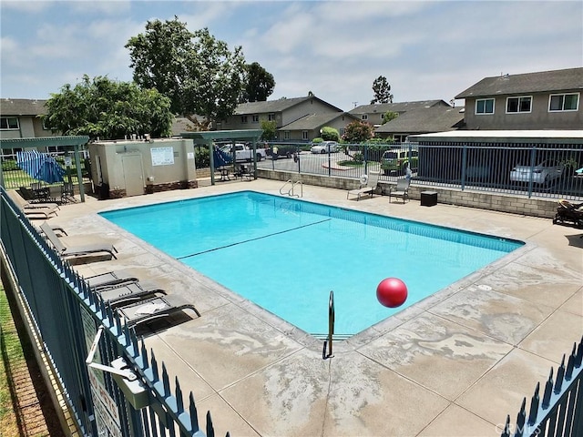 16573 Pescado Ln Unit 3A, Huntington Beach, CA 92649 - community pool featuring a patio area and a residential view