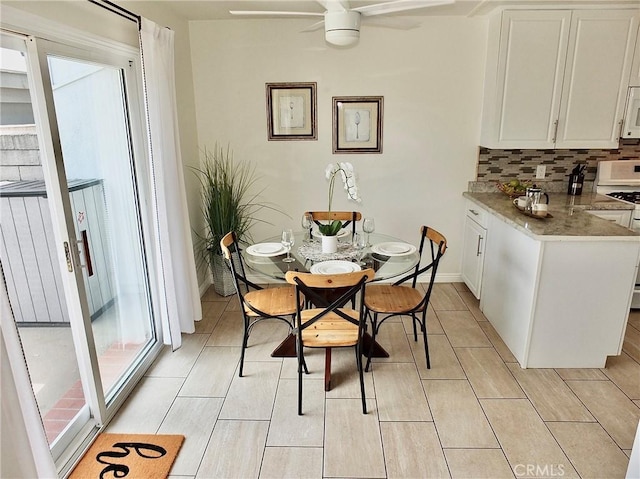 16573 Pescado Ln Unit 3A, Huntington Beach, CA 92649 - dining area with ceiling fan and baseboards