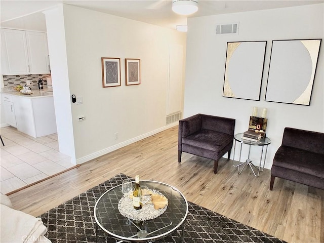 16573 Pescado Ln Unit 3A, Huntington Beach, CA 92649 - sitting room featuring light wood-type flooring and baseboards