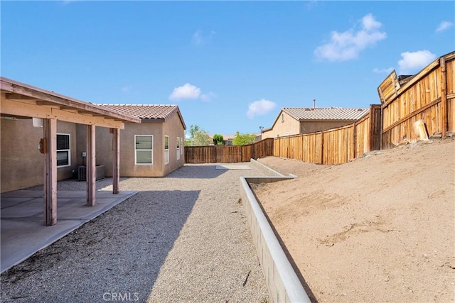 16029 Carmelia Dr, Victorville, CA 92394 - fenced backyard with a patio area