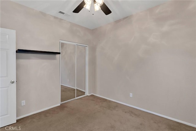 16029 Carmelia Dr, Victorville, CA 92394 - unfurnished bedroom with carpet, a closet, and a ceiling fan