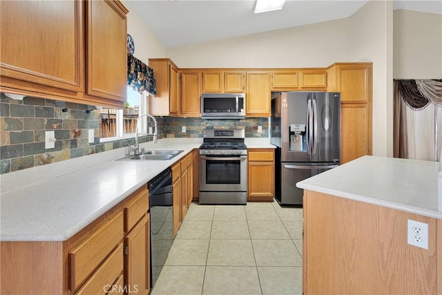 16029 Carmelia Dr, Victorville, CA 92394 - kitchen featuring appliances with stainless steel finishes, lofted ceiling, light tile patterned floors, decorative backsplash, and light countertops