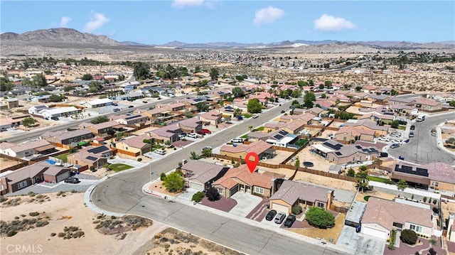 16029 Carmelia Dr, Victorville, CA 92394 - aerial overview of property's location with a mountainous background and nearby suburban area