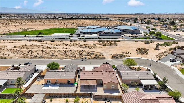 16029 Carmelia Dr, Victorville, CA 92394 - aerial view of sparsely populated area featuring a mountain backdrop and nearby suburban area