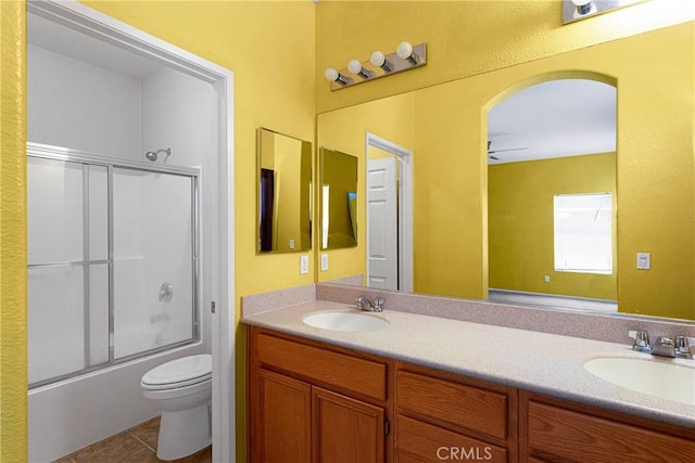 16029 Carmelia Dr, Victorville, CA 92394 - bathroom featuring double vanity, enclosed tub / shower combo, and tile patterned floors