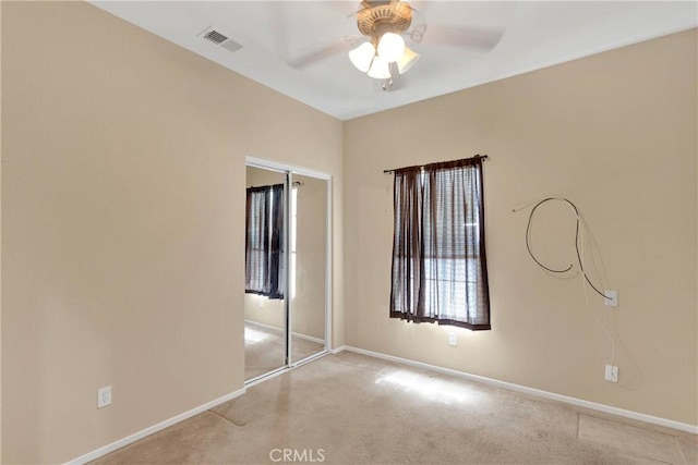 16029 Carmelia Dr, Victorville, CA 92394 - unfurnished bedroom with light colored carpet, a closet, and ceiling fan