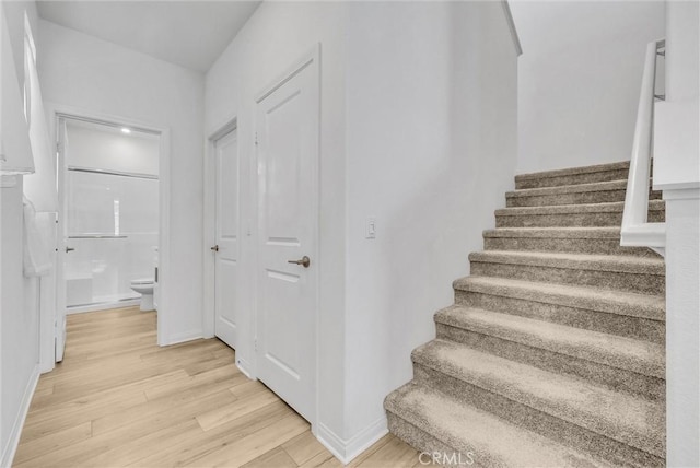 34410 Granite Rd, Yucaipa, CA 92399 - stairway with wood finished floors and baseboards