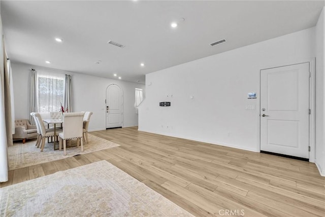 34410 Granite Rd, Yucaipa, CA 92399 - dining space with light wood finished floors, recessed lighting, and arched walkways