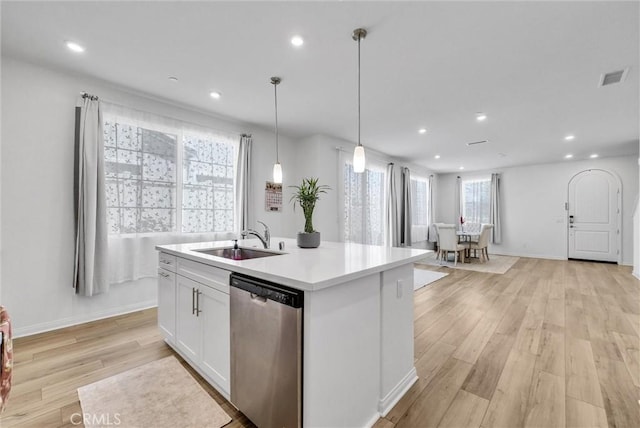 34410 Granite Rd, Yucaipa, CA 92399 - kitchen featuring stainless steel dishwasher, recessed lighting, light wood finished floors, white cabinetry, and light countertops