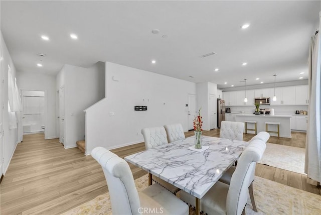 34410 Granite Rd, Yucaipa, CA 92399 - dining area featuring light wood-type flooring and recessed lighting