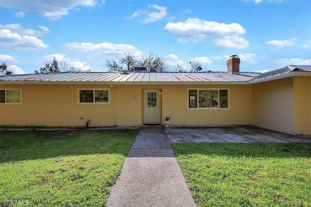 13001 Yuba Nevada Rd, Dobbins, CA 95935 - ranch-style house featuring stucco siding, a standing seam roof, a metal roof, and a front yard