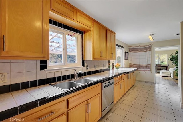 13001 Yuba Nevada Rd, Dobbins, CA 95935 - kitchen featuring tile counters, dishwasher, and plenty of natural light