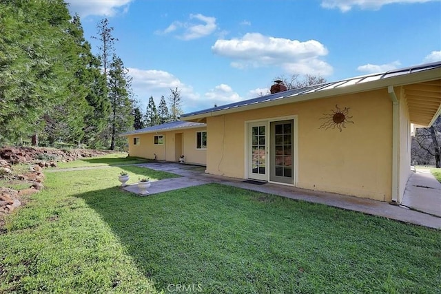 13001 Yuba Nevada Rd, Dobbins, CA 95935 - view of green lawn featuring a patio area