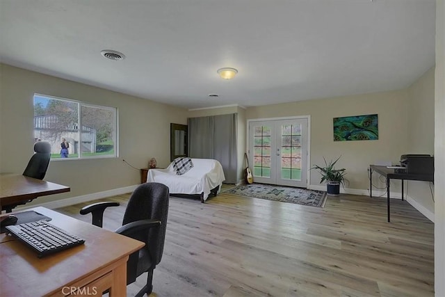13001 Yuba Nevada Rd, Dobbins, CA 95935 - bedroom featuring french doors, a desk, wood finished floors, and access to outside
