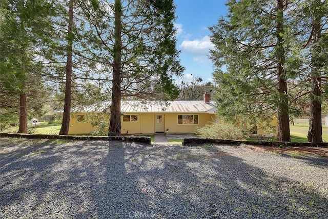 13001 Yuba Nevada Rd, Dobbins, CA 95935 - ranch-style house with a chimney and a metal roof