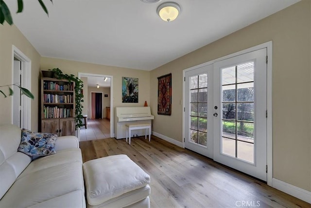 13001 Yuba Nevada Rd, Dobbins, CA 95935 - living area featuring light wood-style floors and french doors