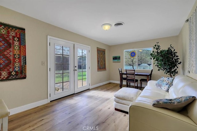 13001 Yuba Nevada Rd, Dobbins, CA 95935 - living area with french doors and light wood-type flooring