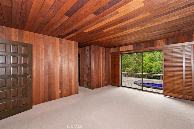 29240 Palos Verdes Dr E, Rancho Palos Verdes, CA 90275 - carpeted empty room featuring wooden walls and wood ceiling