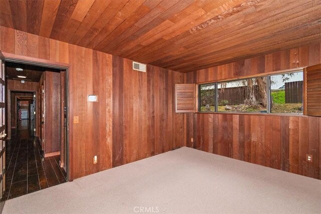 29240 Palos Verdes Dr E, Rancho Palos Verdes, CA 90275 - spare room with wooden ceiling, wooden walls, and carpet floors