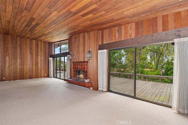 29240 Palos Verdes Dr E, Rancho Palos Verdes, CA 90275 - unfurnished living room with carpet floors, a brick fireplace, wood walls, and wood ceiling