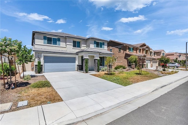 29812 Juniper Ct, Menifee, CA 92584 - view of front facade with a residential view, stucco siding, a garage, driveway, and stone siding