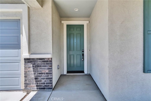 29812 Juniper Ct, Menifee, CA 92584 - property entrance featuring stucco siding and stone siding