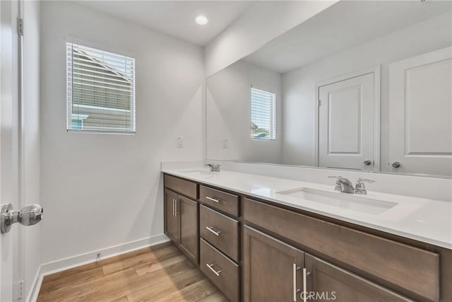 29812 Juniper Ct, Menifee, CA 92584 - full bath with double vanity, wood finished floors, and recessed lighting