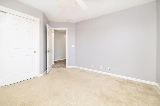 1085 Admiral Ln, Chico, CA 95973 - unfurnished bedroom with carpet flooring, a ceiling fan, and a closet