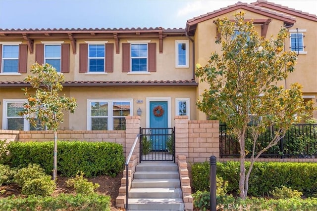 28606 Jardineras Dr, Valencia, CA 91354 - view of front of home featuring stucco siding