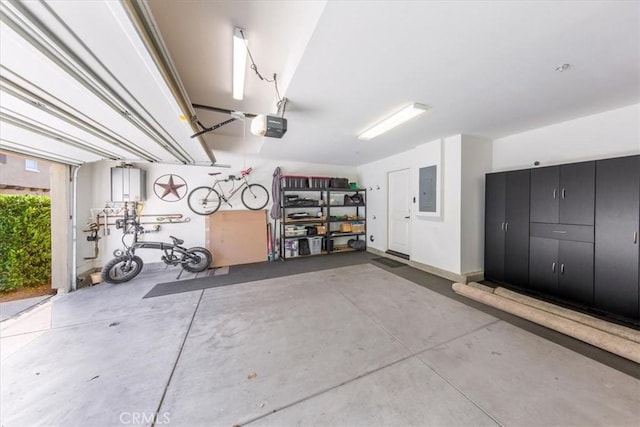 28606 Jardineras Dr, Valencia, CA 91354 - garage featuring electric panel and a garage door opener