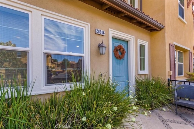 28606 Jardineras Dr, Valencia, CA 91354 - entrance to property featuring stucco siding