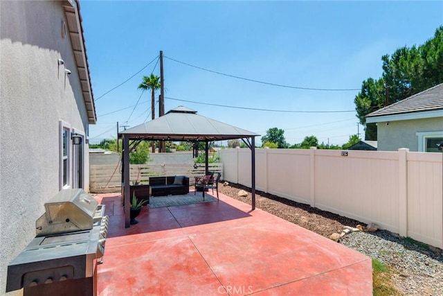 7002 Alice St, Highland, CA 92346 - fenced backyard featuring a patio, a gazebo, area for grilling, and an outdoor living space