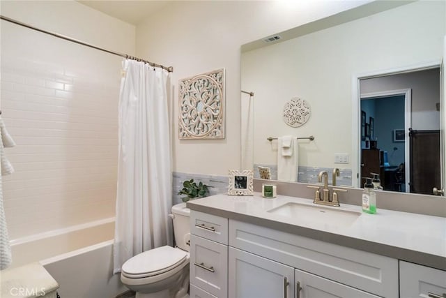 7002 Alice St, Highland, CA 92346 - full bathroom featuring vanity and shower / bath combo with shower curtain