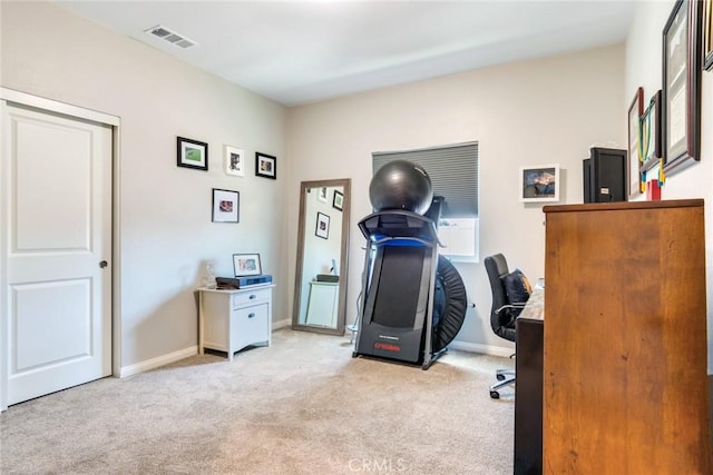 7002 Alice St, Highland, CA 92346 - home office featuring light colored carpet and baseboards